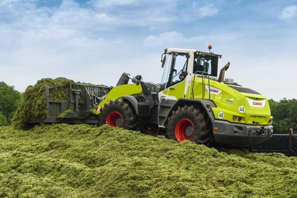 torion wheel loader in action on a silage stack